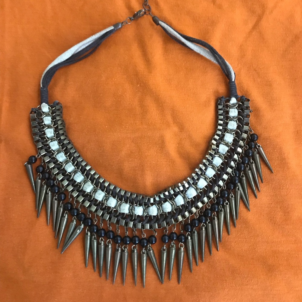 Metal and tassel necklace